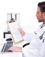 busy doctor working with his reports