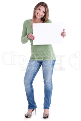 Smiling young beautiful woman holding blank white board
