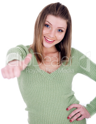 Smiling beautiful girl showing her thumps up