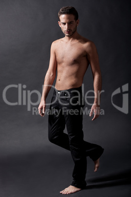 Fashion male model with black jean