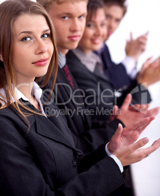 Group of business people clapping