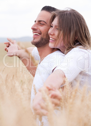 Happy young couple smiling