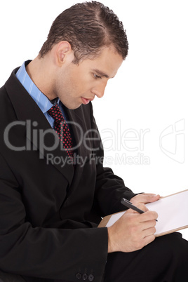 Closeup of a business man writing down