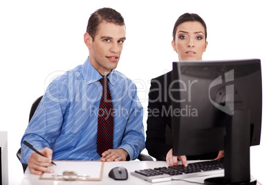 Business women pointing something on their computer