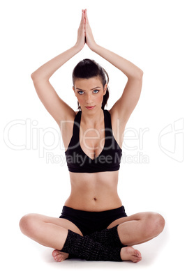 Young woman doing yoga exercise