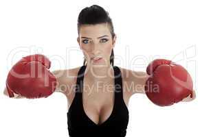 Sexy female posing with red boxing gloves