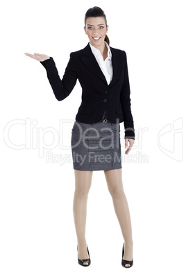 Full length of young woman pointing copysapce