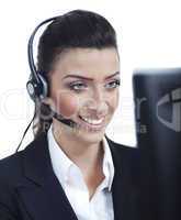 Young blond business woman with headset closeup