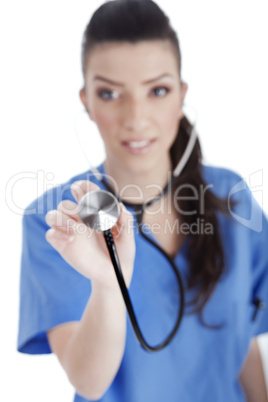 Blurred image of the nurse holding stethoscope