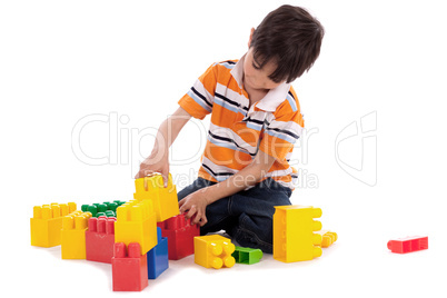 Smart boy playing with blocks