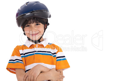 Kid with head cap ready for bicycle ride