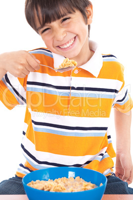 Young boy eating his breakfast