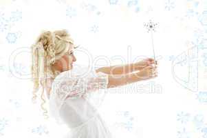 fairy with magic wand and snowflakes