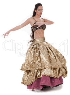 Beautiful belly dancer in rich costume
