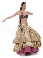 Beautiful belly dancer in rich costume