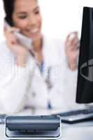 Telephone of focus, doctor talking with it