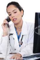 Asian female doctor talking over phone