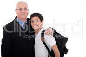 Close up shot of old business man embraces a teenager