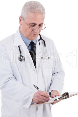 Portrait of senior doctor writing reports