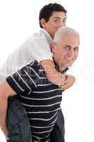 Grandfather piggybacking his grandson