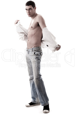 Trendy model show his muscles in jean