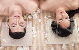 Beautiful relaxing couple in a spa closeup shot