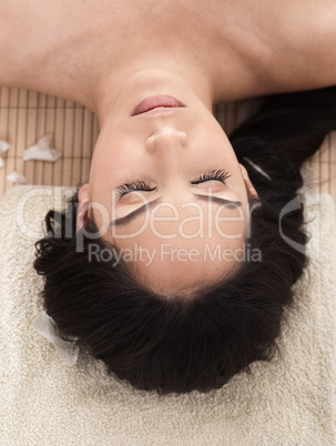 Portrait of beautiful woman while spa treatment