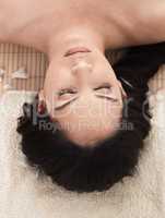 Portrait of beautiful woman while spa treatment