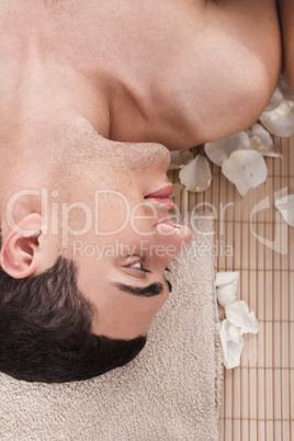 Man relaxing in spa salon