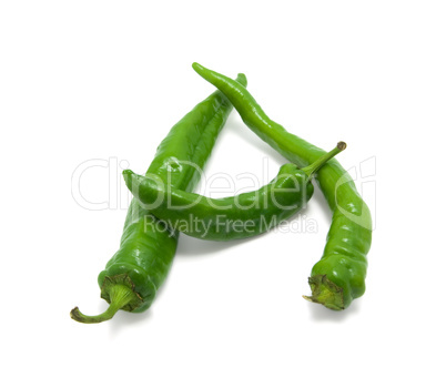 Letter A composed of green peppers