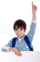Elementary school kid raising his hand