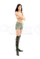topless brunette in green shorts and boots