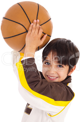 Little kid while throwing the ball