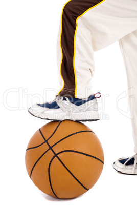 A small kid leg over the ball