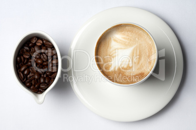 coffee cup and colombian coffee beans