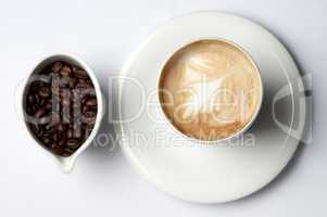 coffee cup and colombian coffee beans