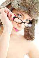 beauty in winter hat and eyeglasses