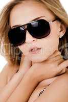 Fashion shot of a beautiful women with sunglasses