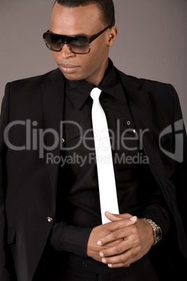 Serious black business man with sunglasses