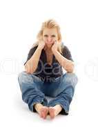 offended girl sitting on the floor