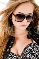 Young brunette model with sunglasses