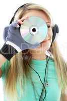 urban teenage girl in headphones holding cd