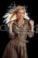 dancing blond in brown dress
