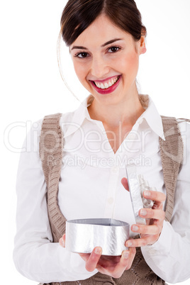 Women smiling and happily opening her gift