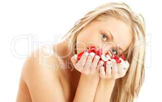 lovely blond in spa with red and white rose petals #2