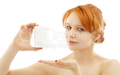 lovely redhead showing blank medication container