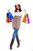 Young girl happy with lot of shopping bags