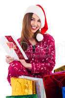 Santa girl holding a christmas card