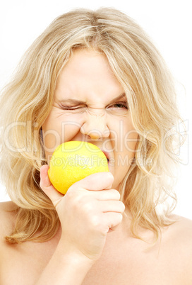 lovely blond biting lemon
