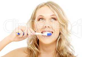 happy blond with toothbrush